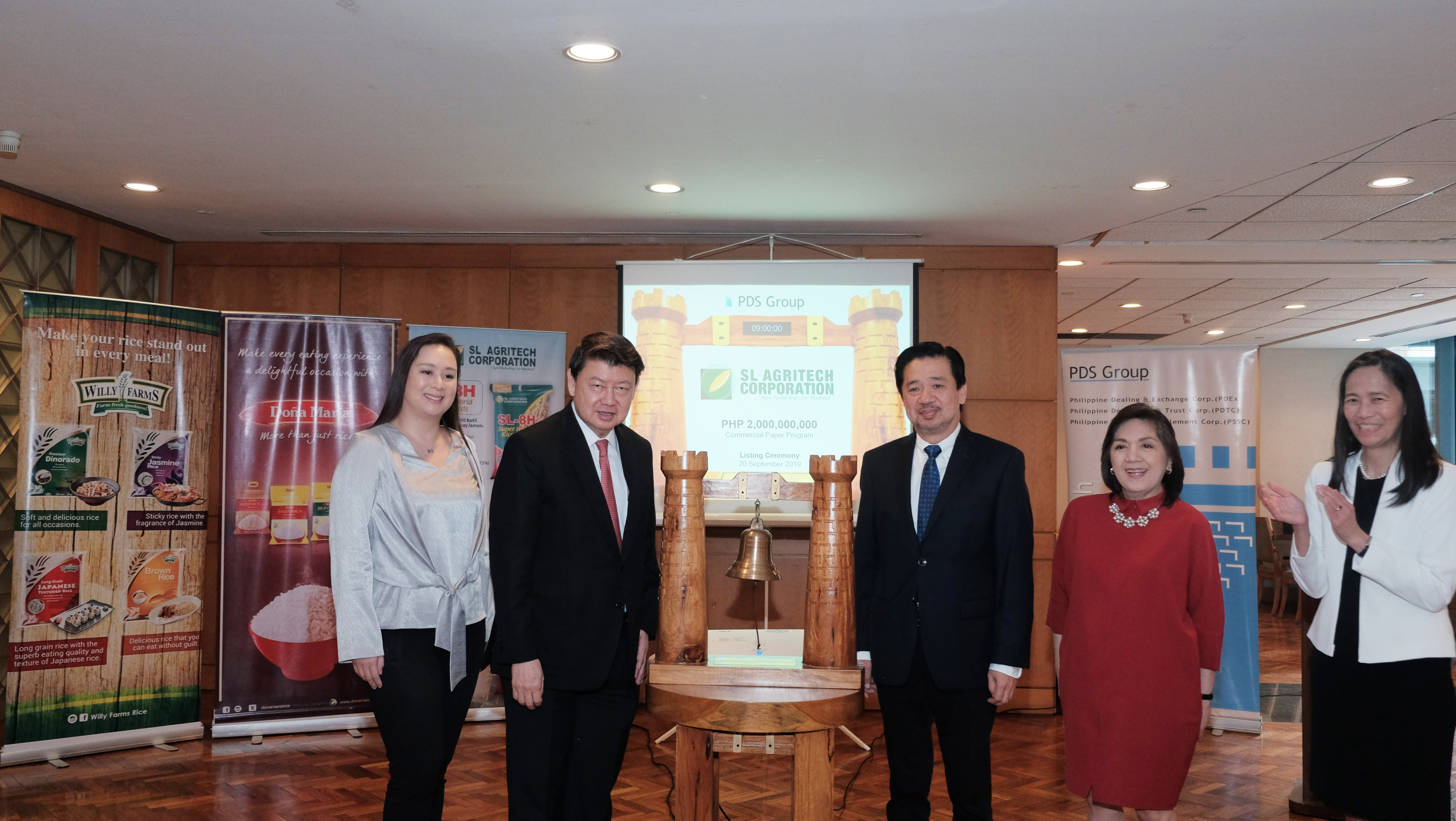 In the photo are (from left) SL Agritech Corporation (SLAC) Senior Vice President for Sales and Marketing Michelle Lim Gankee, SLAC Chairman and President Henry Lim Bon Liong, SLAC Executive Vice President and Chief Financial Officer Gerry Lim Bon Hiong, Multinational Investment Bancorporation President Marilou Cristobal, and PDS Group President Ma. Theresa B. Ravalo