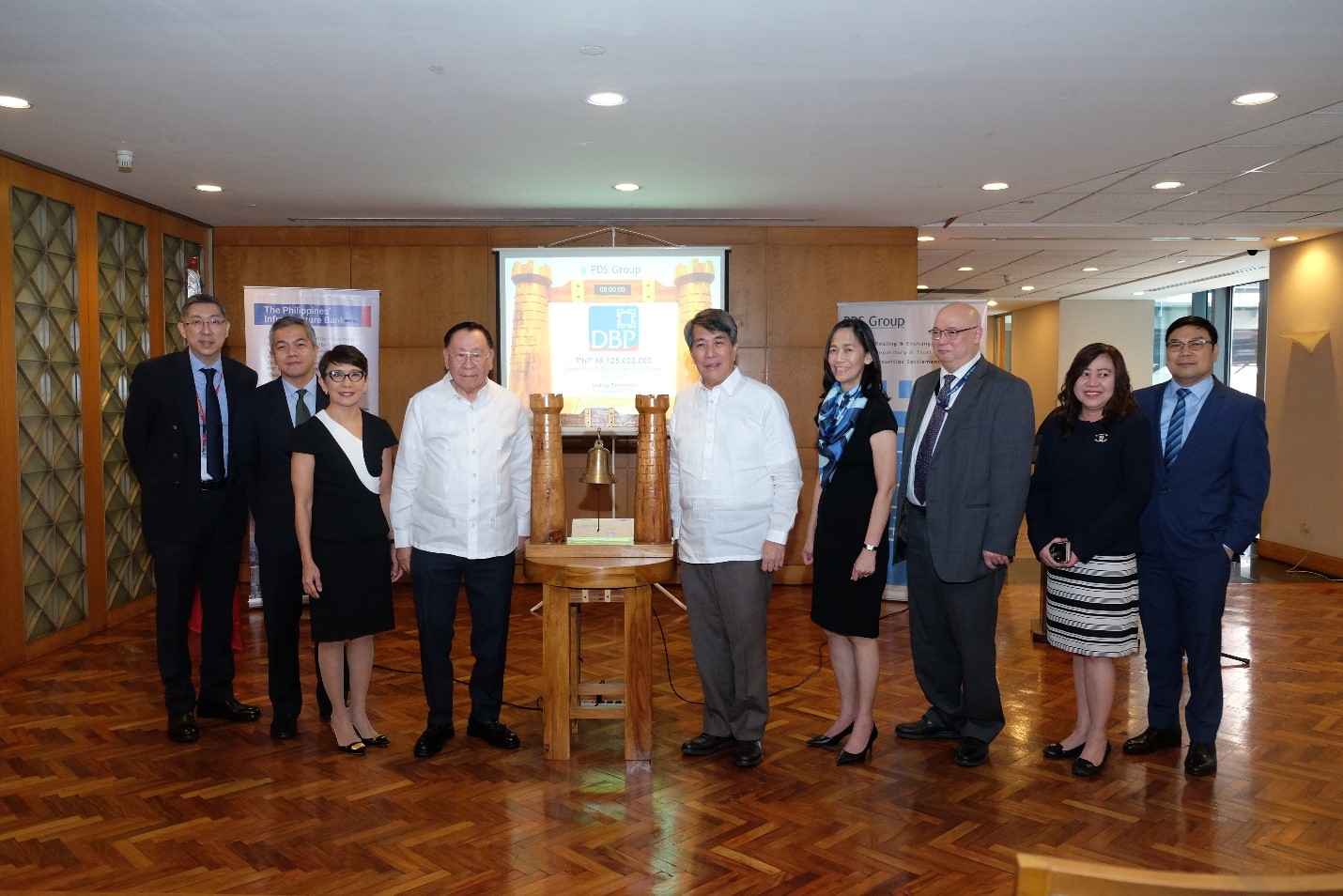 In photo from left are: China Banking Corporation Chief Finance Officer Patrick Cheng, China Banking Capital Corporation President Ryan Martin Tapia, Standard Chartered Chief Executive Officer Lynette Ortiz, Development Bank of the Philippines (DBP) Chairman Alberto Romulo, DBP President and Chief Executive Officer Emmanuel G. Herbosa, PDS Group President Ma. Theresa Ravalo, Philippine Dealing & Exchange Corp. President and Chief Operating Officer Antonino Nakpil, Land Bank of the Philippines - Trust Banking Group Assistant Vice President Analiza Vasco, and Amalgamated Investment Bancorporation Executive Vice President and Chief Finance Officer Servando Alvarez Jr.